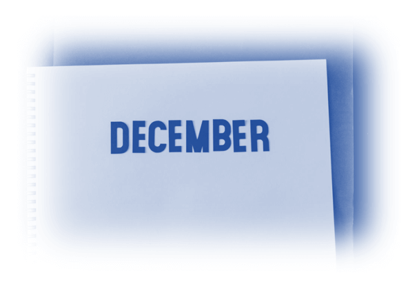 Image showing a work book open with December written on it to signify this is about what happened in December -PPC News December 2020 – PPC Geeks Monthly Updates