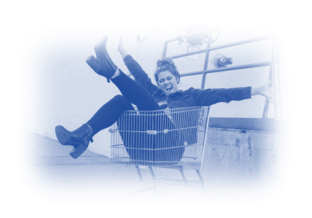 Image showing a lady in a shopping trolley - this is to show that this post is about New Google Merchant Center Product Data Specifications