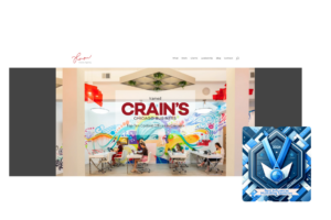 Heron Agency's office space with colorful mural and Crain's Chicago Business recognition, featuring a 'Best Influencer Marketing Agencies' blue award for 2024.