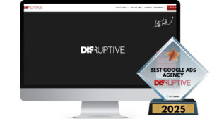 Disruptive Advertising's website displayed on a computer screen, with a 2025 Best Google Ads Agency award beside it.