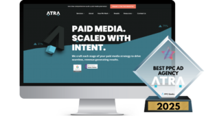 ATRA website displayed on a computer screen, with a 2025 Best PPC Ad Agency award beside it.