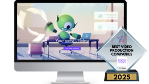 A computer screen featuring Pigeon Studio’s homepage with a whimsical green animated character at a desk and a Best Video Production Companies 2025 award in the foreground.