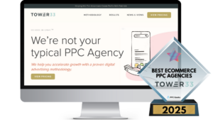 A computer screen displaying the Tower33 website, showcasing their PPC services, with an award badge for Best eCommerce PPC Agencies 2025 in the foreground.